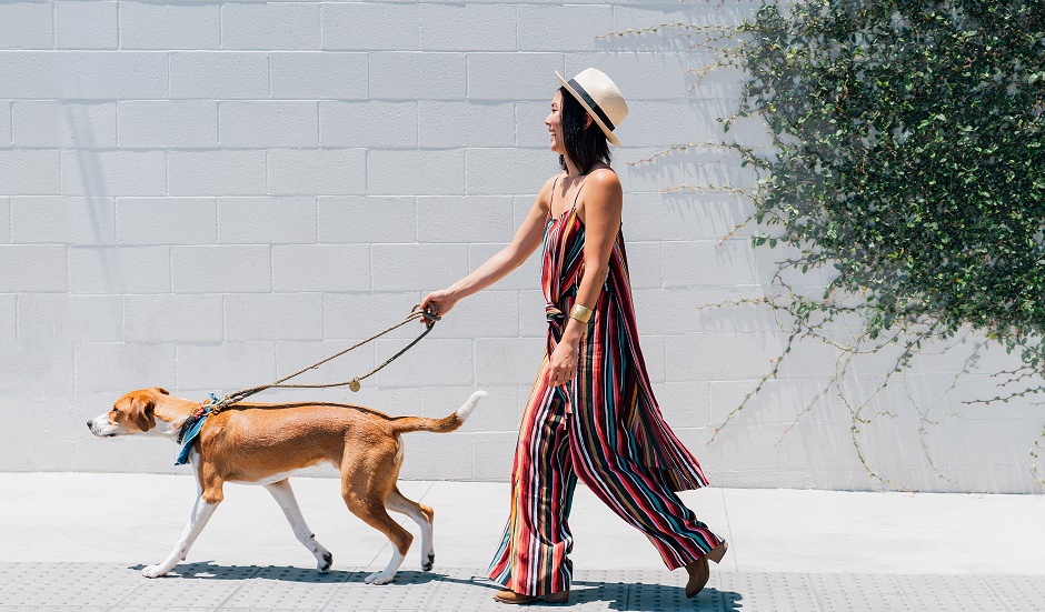 Woman walking dog